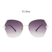 Load image into Gallery viewer, Luxury Women's Diamond Cat Eye Sunglasses Oversizd Summer Travel Shades Women Brand Rimless Sun Glasses Crystal Oculos de sol UV