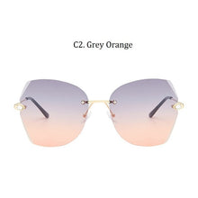 Load image into Gallery viewer, Luxury Women&#39;s Diamond Cat Eye Sunglasses Oversizd Summer Travel Shades Women Brand Rimless Sun Glasses Crystal Oculos de sol UV
